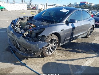 2022 Tesla Model 3, VIN 5YJ3E1EB7NF239648. Фото 2 з 6 з аукціону IAAI. Каталог авто зі США OpenDataCar.