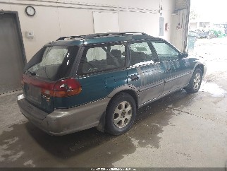 1999 Subaru Legacy, VIN 4S3BG6850X7648477. Photo 4 of 6 from IAAI auction. OpenDataCar US salvage catalog.