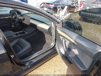 2023 Tesla Model 3, VIN 5YJ3E1EA4PF661175. Фото 5 из 6 с аукциона IAAI. Каталог авто из США OpenDataCar.