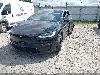 2023 Tesla Model X, VIN 7SAXCBE54PF381405. Фото 2 из 6 с аукциона IAAI. Каталог авто из США OpenDataCar.