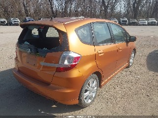 2009 Honda Fit, VIN JHMGE88449S053127. Photo 4 of 6 from IAAI auction. OpenDataCar US salvage catalog.