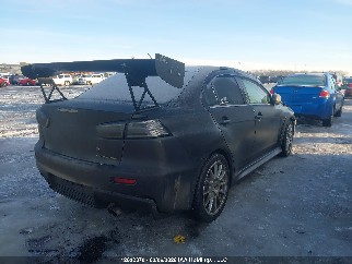 2014 Mitsubishi Lancer Evolution, VIN JA32W5FV0EU604573. Фото 4 з 6 з аукціону IAAI. Каталог авто зі США OpenDataCar.