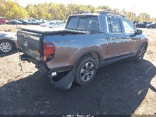 2018 Honda Ridgeline, VIN 5FPYK3F77JB014457. Фото 4 з 6 з аукціону IAAI. Каталог авто зі США OpenDataCar.