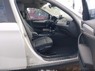 2014 Bmw X1, VIN WBAVL1C56EVY18057. Фото 5 з 6 з аукціону IAAI. Каталог авто зі США OpenDataCar.