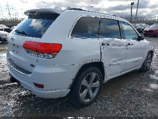 2014 Jeep Grand Cherokee, VIN 1C4RJFCG5EC382161. Photo 4 of 6 from IAAI auction. OpenDataCar US salvage catalog.