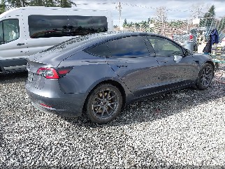 2023 Tesla Model 3, VIN 5YJ3E1EA0PF675574. Фото 4 з 6 з аукціону IAAI. Каталог авто зі США OpenDataCar.
