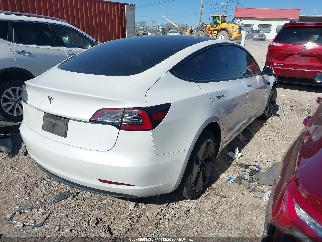 2023 Tesla Model 3, VIN 5YJ3E1EA8PF701080. Фото 4 з 6 з аукціону IAAI. Каталог авто зі США OpenDataCar.