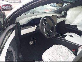2026 Tesla Model X, VIN 7SAXCBE67TF478665. Фото 5 из 6 с аукциона IAAI. Каталог авто из США OpenDataCar.
