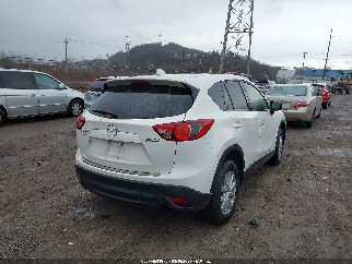 2015 Mazda CX-5, VIN JM3KE4CY0F0541150. Фото 4 з 6 з аукціону IAAI. Каталог авто зі США OpenDataCar.