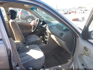 1999 Toyota Corolla, VIN 2T1BR12E7XC164780. Photo 5 of 6 from IAAI auction. OpenDataCar US salvage catalog.