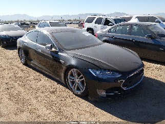 2014 Tesla Model S, VIN 5YJSA1H15EFP52844. Фото 1 из 6 с аукциона IAAI. Каталог авто из США OpenDataCar.