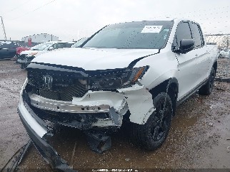 2023 Honda Ridgeline, VIN 5FPYK3F81PB006453. Фото 2 з 6 з аукціону IAAI. Каталог авто зі США OpenDataCar.