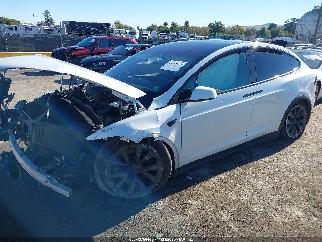 2022 Tesla Model X, VIN 7SAXCDE55NF339480. Фото 2 из 6 с аукциона IAAI. Каталог авто из США OpenDataCar.