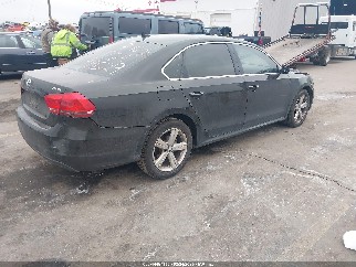 2014 Volkswagen Passat, VIN 1VWBS7A31EC062577. Фото 4 з 6 з аукціону IAAI. Каталог авто зі США OpenDataCar.