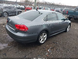 2014 Volkswagen Passat, VIN 1VWBT7A37EC058269. Фото 4 з 6 з аукціону IAAI. Каталог авто зі США OpenDataCar.