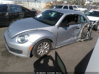 2014 Volkswagen Beetle, VIN 3VWF17AT8EM647708. Фото 2 з 6 з аукціону IAAI. Каталог авто зі США OpenDataCar.
