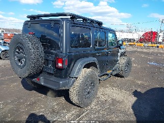 2023 Jeep Wrangler, VIN 1C4HJXDN3PW647515. Фото 4 з 6 з аукціону IAAI. Каталог авто зі США OpenDataCar.