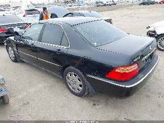 1999 Acura RL, VIN JH4KA9665XC008107. Фото 3 из 6 с аукциона IAAI. Каталог авто из США OpenDataCar.