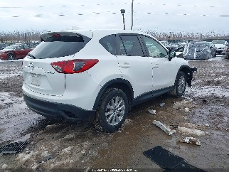 2015 Mazda CX-5, VIN JM3KE4CY0F0472668. Фото 4 з 6 з аукціону IAAI. Каталог авто зі США OpenDataCar.