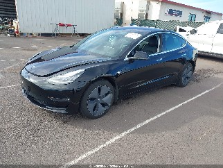 2019 Tesla Model 3, VIN 5YJ3E1EA7KF297200. Фото 2 з 6 з аукціону IAAI. Каталог авто зі США OpenDataCar.