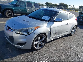 2014 Hyundai Veloster, VIN KMHTC6AD0EU208531. Фото 2 з 6 з аукціону IAAI. Каталог авто зі США OpenDataCar.