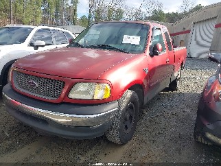 2001 Ford F-150, VIN 1FTRX17L01NB91030. Фото 2 з 6 з аукціону IAAI. Каталог авто зі США OpenDataCar.