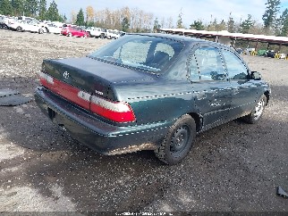 1997 Toyota Corolla, VIN 1NXBA02E0VZ609552. Фото 4 з 6 з аукціону IAAI. Каталог авто зі США OpenDataCar.