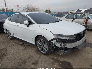 2018 Honda Clarity Plug In Hybrid, VIN JHMZC5F10JC010960. Фото 1 из 6 с аукциона IAAI. Каталог авто из США OpenDataCar.
