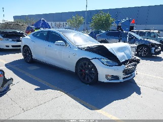 2014 Tesla Model S, VIN 5YJSA1H28EFP63572. Photo 1 of 6 from IAAI auction. OpenDataCar US salvage catalog.