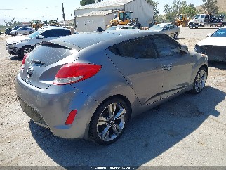 2012 Hyundai Veloster, VIN KMHTC6AD1CU070026. Фото 4 з 6 з аукціону IAAI. Каталог авто зі США OpenDataCar.