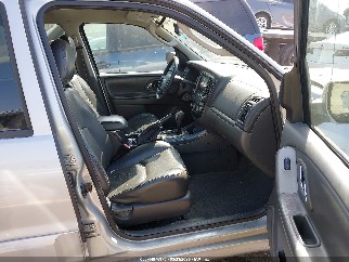 2005 Mazda Tribute, VIN 4F2CZ06145KM49602. Photo 5 of 6 from IAAI auction. OpenDataCar US salvage catalog.