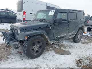 2012 Jeep Wrangler Unlimited, VIN 1C4BJWEG4CL104461. Фото 2 з 6 з аукціону IAAI. Каталог авто зі США OpenDataCar.