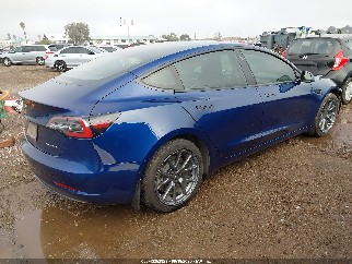 2022 Tesla Model 3, VIN 5YJ3E1EB1NF267512. Фото 4 з 6 з аукціону IAAI. Каталог авто зі США OpenDataCar.