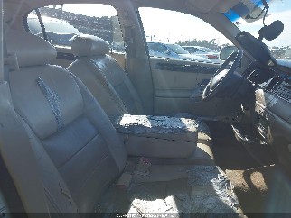 1999 Lincoln Town Car, VIN 1LNHM82WXXY703765. Фото 5 з 6 з аукціону IAAI. Каталог авто зі США OpenDataCar.