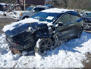 2018 Tesla Model X, VIN 5YJXCAE21JF102397. Фото 2 з 6 з аукціону IAAI. Каталог авто зі США OpenDataCar.