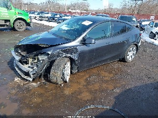 2024 Tesla Model Y, VIN 7SAYGDED6RF093187. Фото 2 з 6 з аукціону IAAI. Каталог авто зі США OpenDataCar.