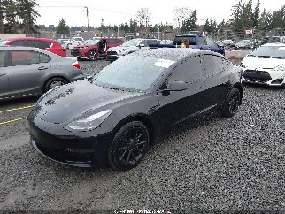 2023 Tesla Model 3, VIN 5YJ3E1EA2PF512621. Фото 2 з 6 з аукціону IAAI. Каталог авто зі США OpenDataCar.