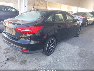 2017 Ford Focus, VIN 1FADP3H2XHL306496. Photo 4 of 6 from IAAI auction. OpenDataCar US salvage catalog.