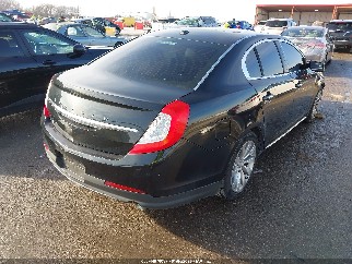 2015 Lincoln MKS, VIN 1LNHL9DK6FG602195. Фото 4 з 6 з аукціону IAAI. Каталог авто зі США OpenDataCar.