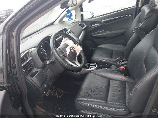 2015 Honda Fit, VIN 3HGGK5H88FM110642. Photo 5 of 6 from IAAI auction. OpenDataCar US salvage catalog.