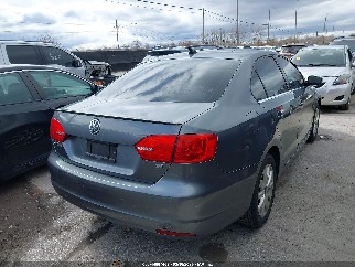 2014 Volkswagen Jetta, VIN 3VWB17AJ8EM410634. Фото 4 з 6 з аукціону IAAI. Каталог авто зі США OpenDataCar.