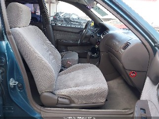 1996 Toyota Corolla, VIN 1NXBB02E4TZ377970. Photo 5 of 6 from IAAI auction. OpenDataCar US salvage catalog.