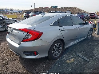 2018 Honda Civic, VIN 2HGFC2F74JH597184. Фото 4 з 6 з аукціону IAAI. Каталог авто зі США OpenDataCar.