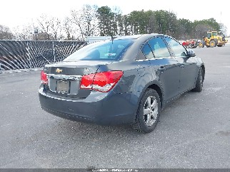 2013 Chevrolet Cruze, VIN 1G1PC5SB5D7155246. Zdjęcie 4 z 6 z aukcji IAAI. Katalog aut z USA OpenDataCar.