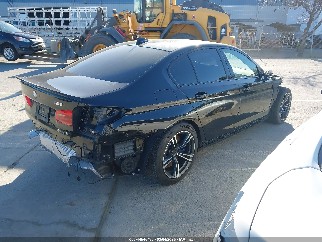 2019 Bmw M5, VIN WBSJF0C52KB285892. Фото 4 из 6 с аукциона IAAI. Каталог авто из США OpenDataCar.