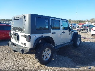 2008 Jeep Wrangler Unlimited, VIN 1J4GA39118L564267. Zdjęcie 4 z 6 z aukcji IAAI. Katalog aut z USA OpenDataCar.