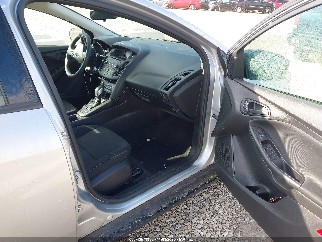 2017 Ford Focus, VIN 1FADP3E21HL337883. Photo 5 of 6 from IAAI auction. OpenDataCar US salvage catalog.