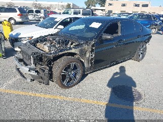 2019 Bmw M5, VIN WBSJF0C52KB285892. Фото 2 из 6 с аукциона IAAI. Каталог авто из США OpenDataCar.