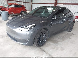 2023 Tesla Model Y, VIN 7SAYGDEF6PF888402. Фото 2 з 6 з аукціону IAAI. Каталог авто зі США OpenDataCar.