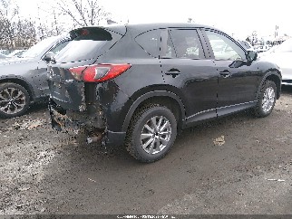 2016 Mazda CX-5, VIN JM3KE4CY5G0893089. Zdjęcie 4 z 6 z aukcji IAAI. Katalog aut z USA OpenDataCar.